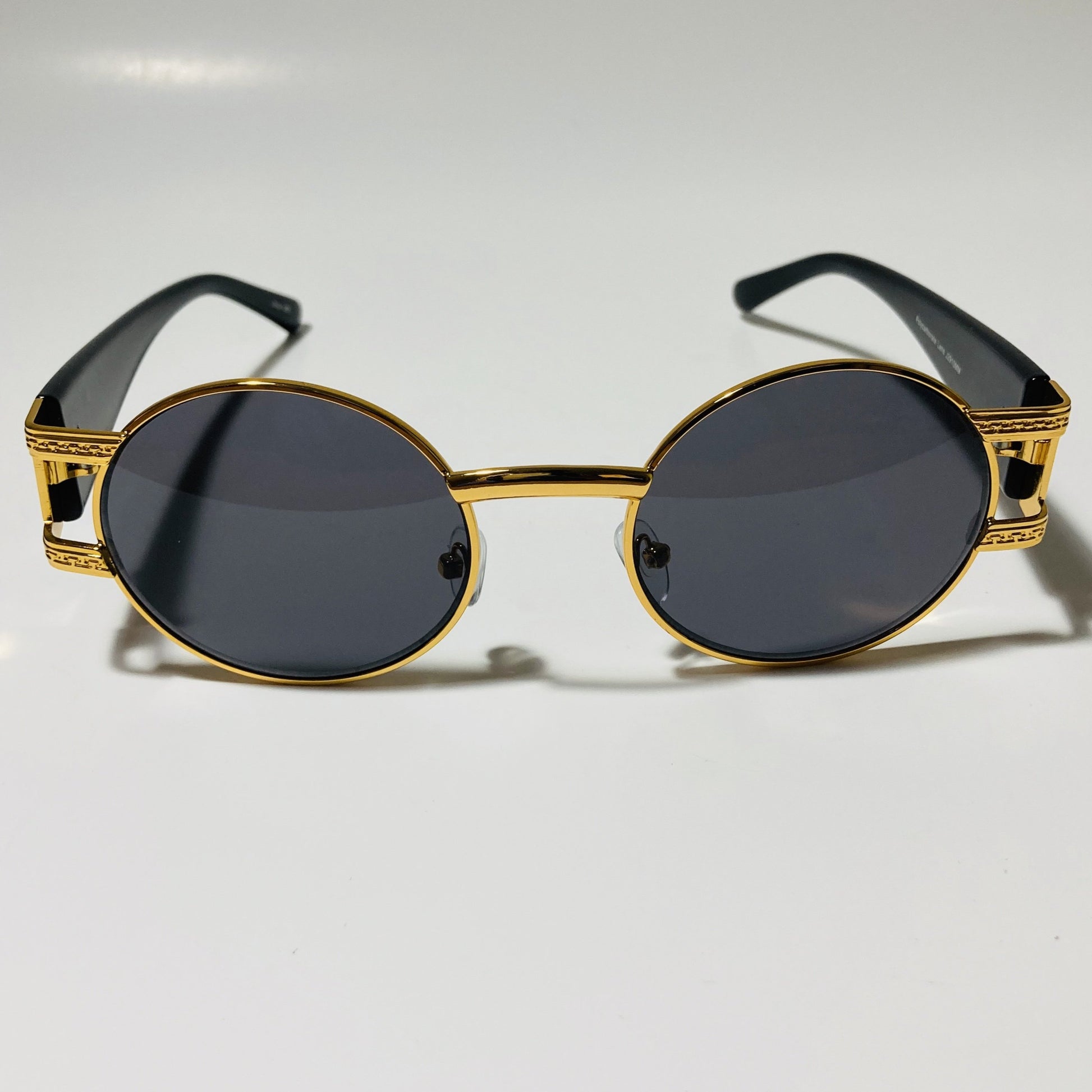 mens and womens black and gold round sunglasses